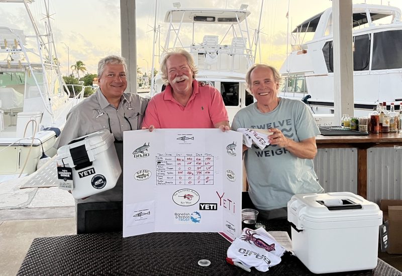 Third place winners of the 2025 Trippe Tarpon Tournament with prizes from Bajío and YETI.